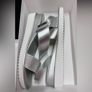 Anne Klein silver wedges.